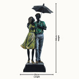 Romantic Couple Under Umbrella Statue