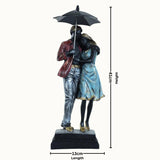 Romantic Colorful Couple with Umbrella Statue