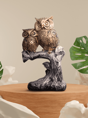 Dual Owl Figurine on Tree Branch